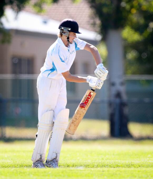 ROCK SOLID: Holbrook's Ed Perryman plays straight in the Des Kennedy Shield final against Brocklesby and District on Sunday. Picture: KYLIE ESLER