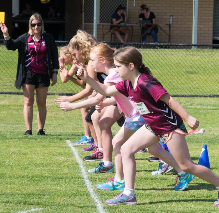 Youngsters prepare for the under-9 girls 100m sprint at Wodonga.