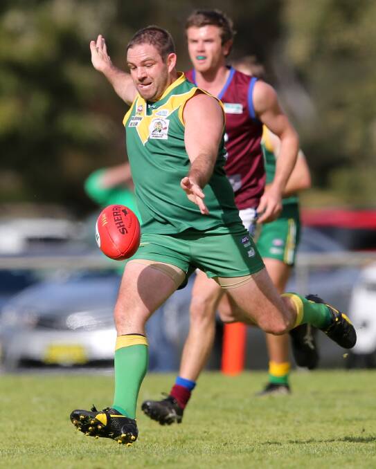 LEADING FROM THE FRONT: Holbrook coach Matt Sharp drives the Brookers forward against Culcairn at Walbundrie on Saturday. Pictures: KYLE ESLER