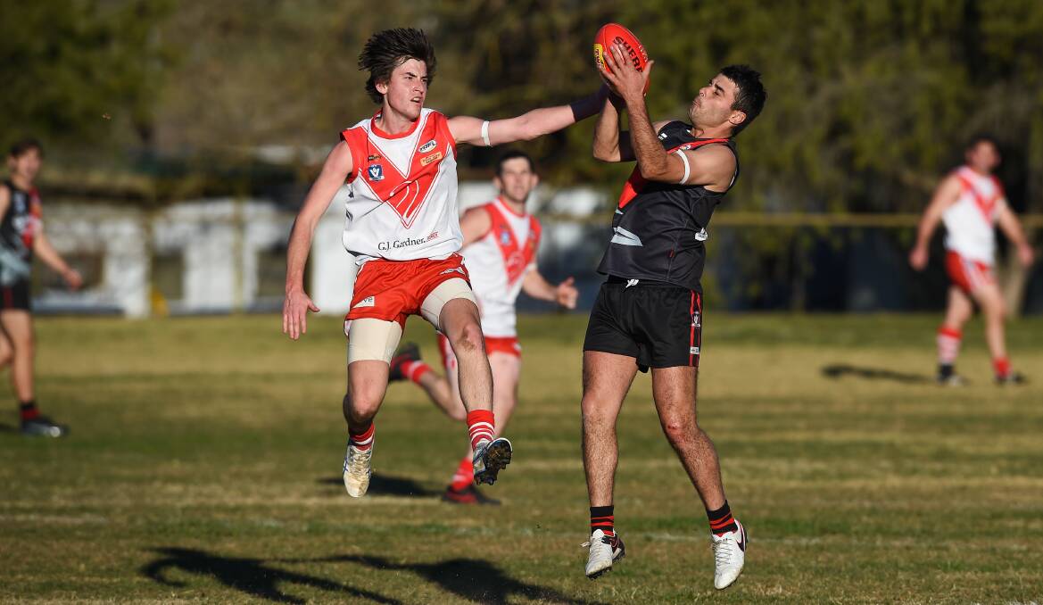 SAFE HANDS: Frank Iaria marks for the Bombers in the Tallangatta and District league on Saturday. Pictures: MARK JESSER