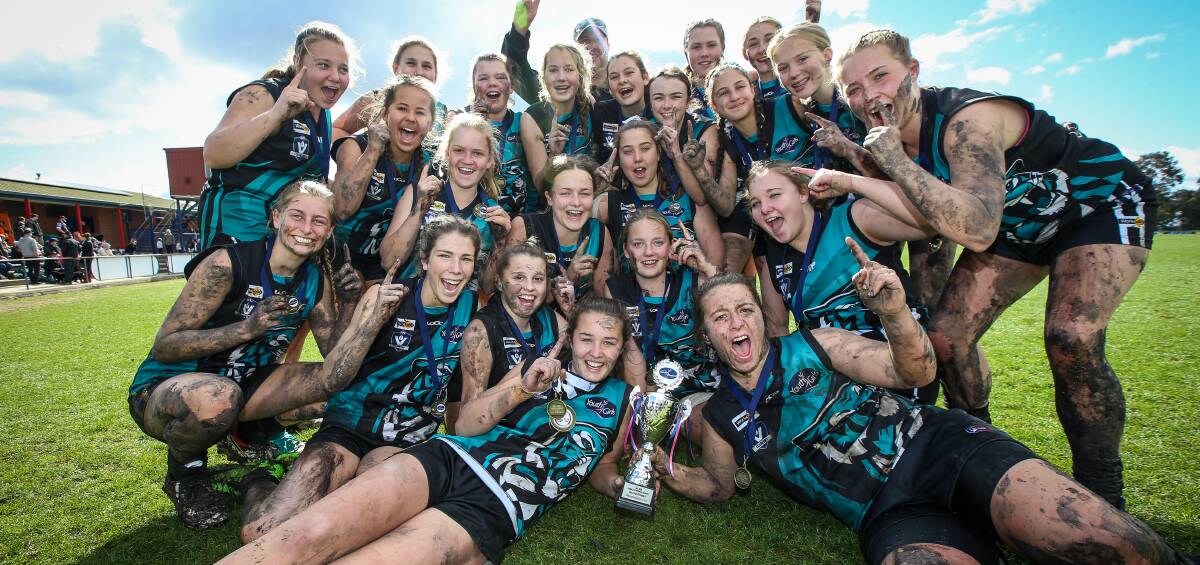 Murray Felines celebrate their 13-point win over Lavington in the youth final at Birallee Park.