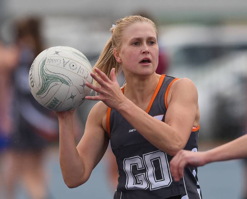 MOVING AHEAD: Giant defender Jess Kotzur in action against Culcairn at Culcairn on Saturday. The Giants ran-out victors by 12 goals to stay in the hunt for the double chance. Pictures: MARK JESSER
