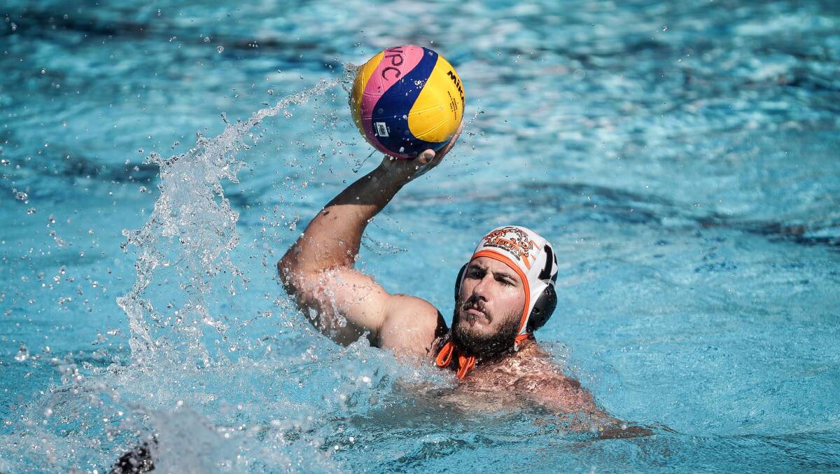  FINDING SPACE: Albury Tigers' Ben Land in action against Pool Pirates during their A-grade men's clash. Picture: JAMES WILTSHIRE