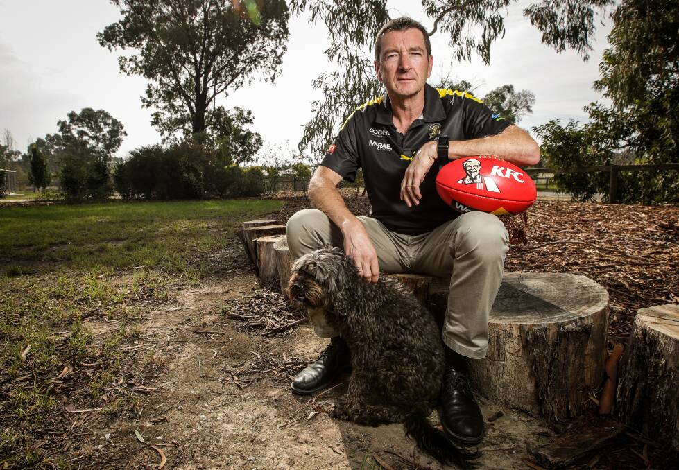 New Albury co-coach Tom McGrath
with his dog Scruff. Picture: JAMES WILTSHIRE