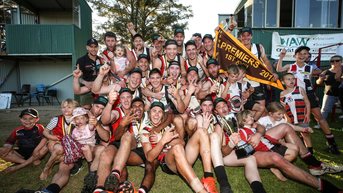 Brock-Burrum players celebrate last year's 50-point grand final victory over Jindera. The Saints kicked eight goals to one in the final quarter.