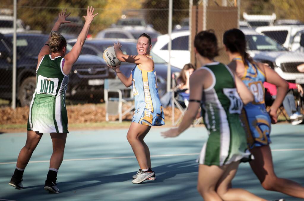 Tallangatta's Jo Withers looks to pass in a thrilling final quarter.