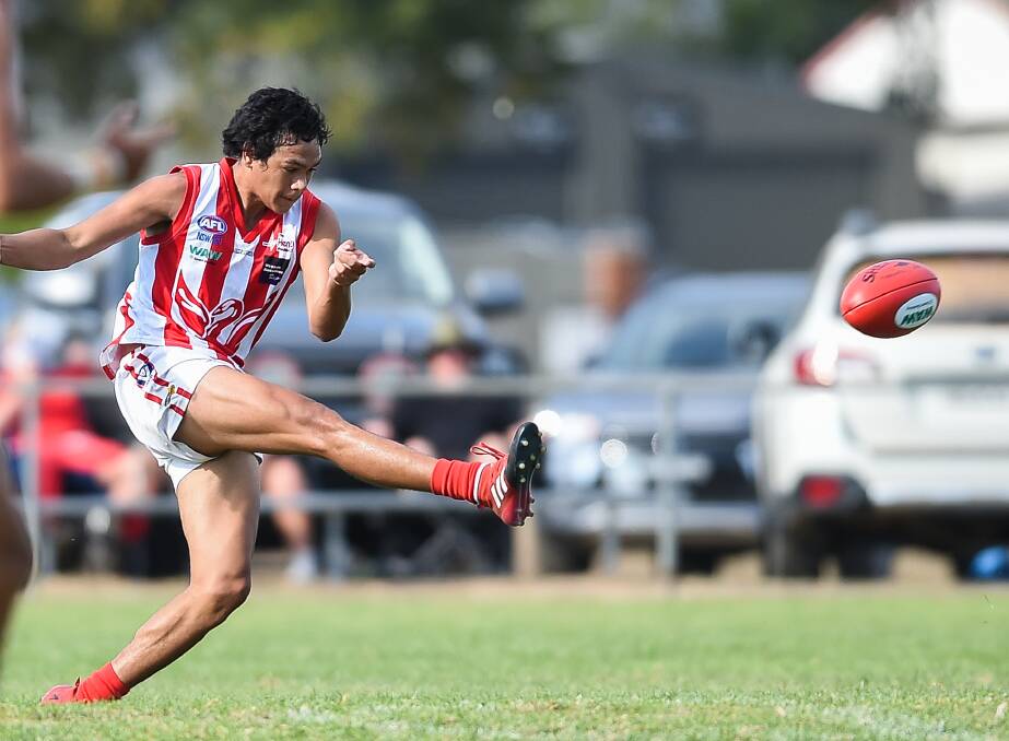 Henty's Dale Cox turned in another strong performance to help keep the Swampies' undefeated record intact.