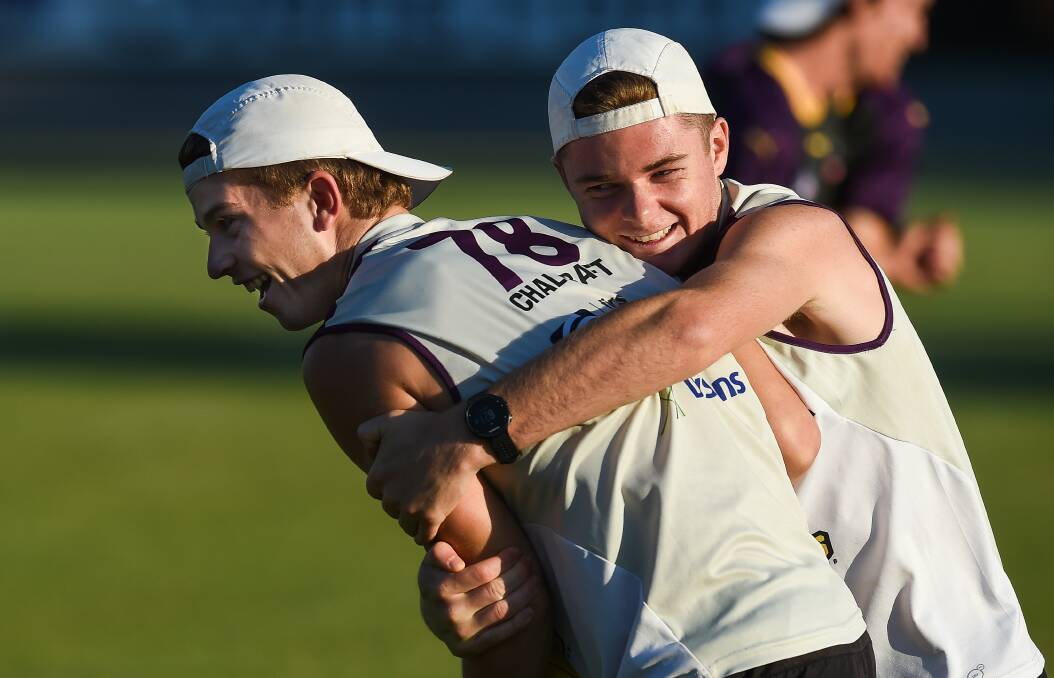 Bushranger Kade Chalcraft is tackled by Jhett Cooper at training. Chalcraft has been named on the interchange against Bendigo Pioneers.
