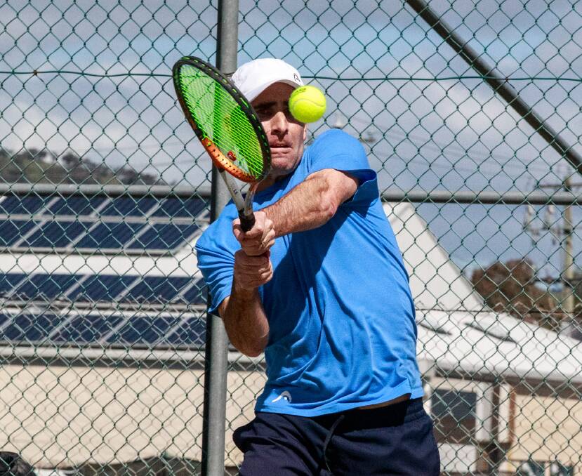 Cameron Meagher returns a backhand during his singles match for Wodonga at the weekend.