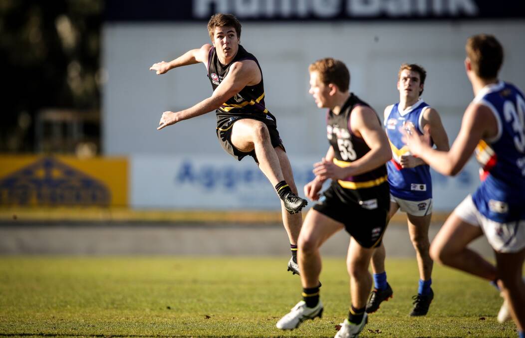 GOING LONG: Wodonga Raiders' youngster Declan Everett drives the Murray Bushrangers into attack during their narrow loss to ladder leader Eastern Ranges on Saturday. Picture: JAMES WILTSHIRE