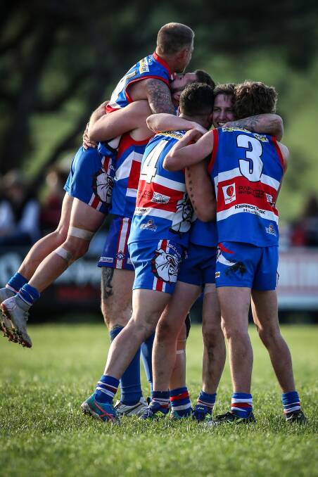 Bullioh players celebrate last year's Upper Murray grand final win over Federal.