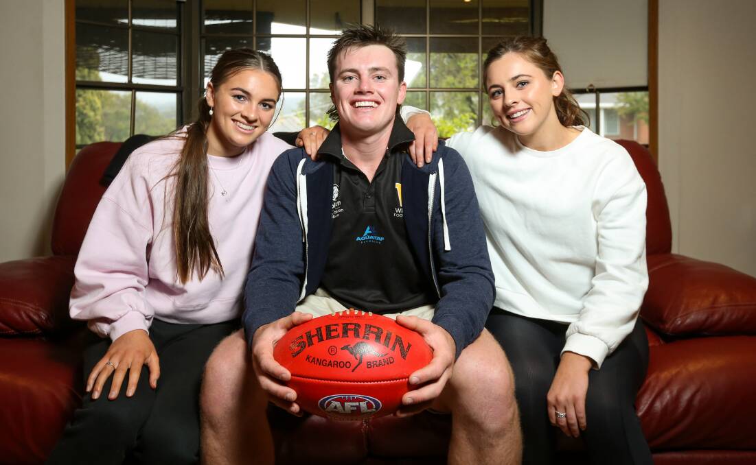 Werribee's Dom Brew has used the coronavirus break to spend time with his sisters, Evy, and Issy, in Albury. Picture: JAMES WILTSHIRE