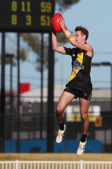 Promising midfielder Shaun Driscoll in action for Wagga Tigers this year. He played a major role in the club's Riverina league flag. Picture: DAILY ADVERTISER
