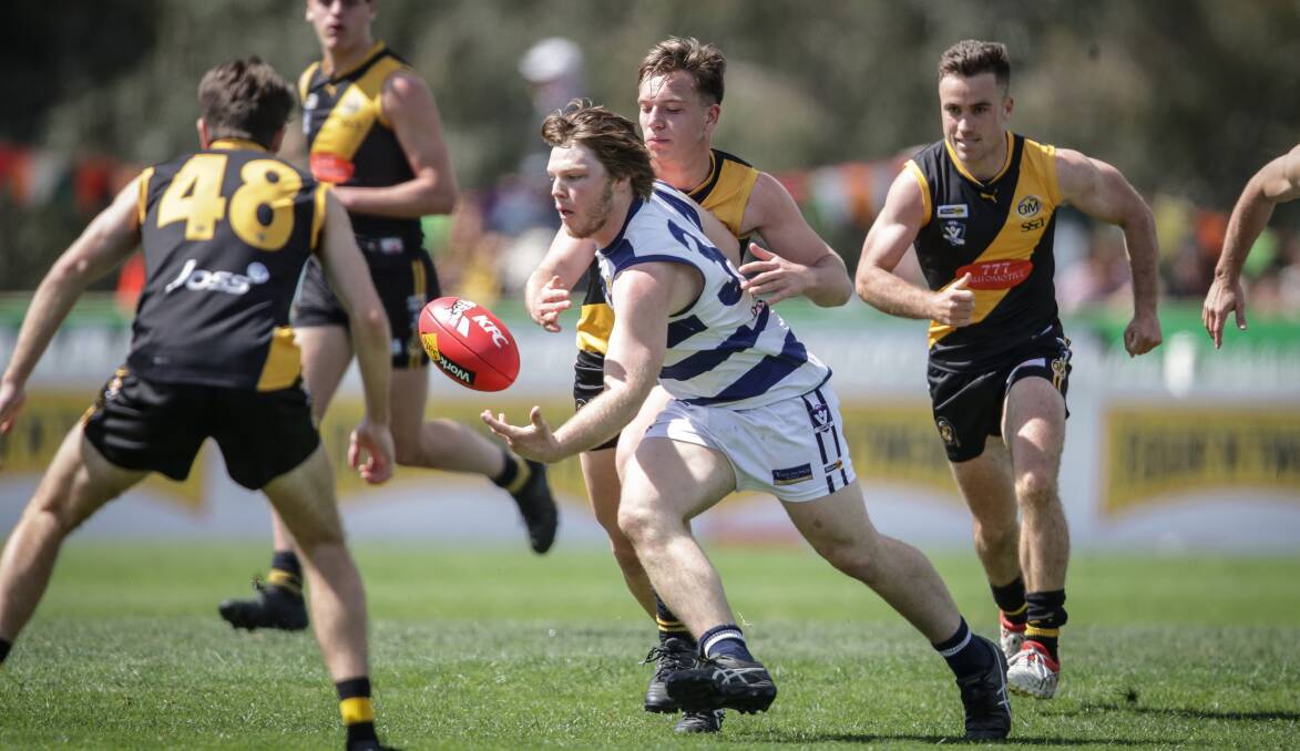 Yarrawonga's Travis Hargreaves kept his cool in heavy traffic against Albury in the reserves. He was one of the Pigeons' best players in the win.