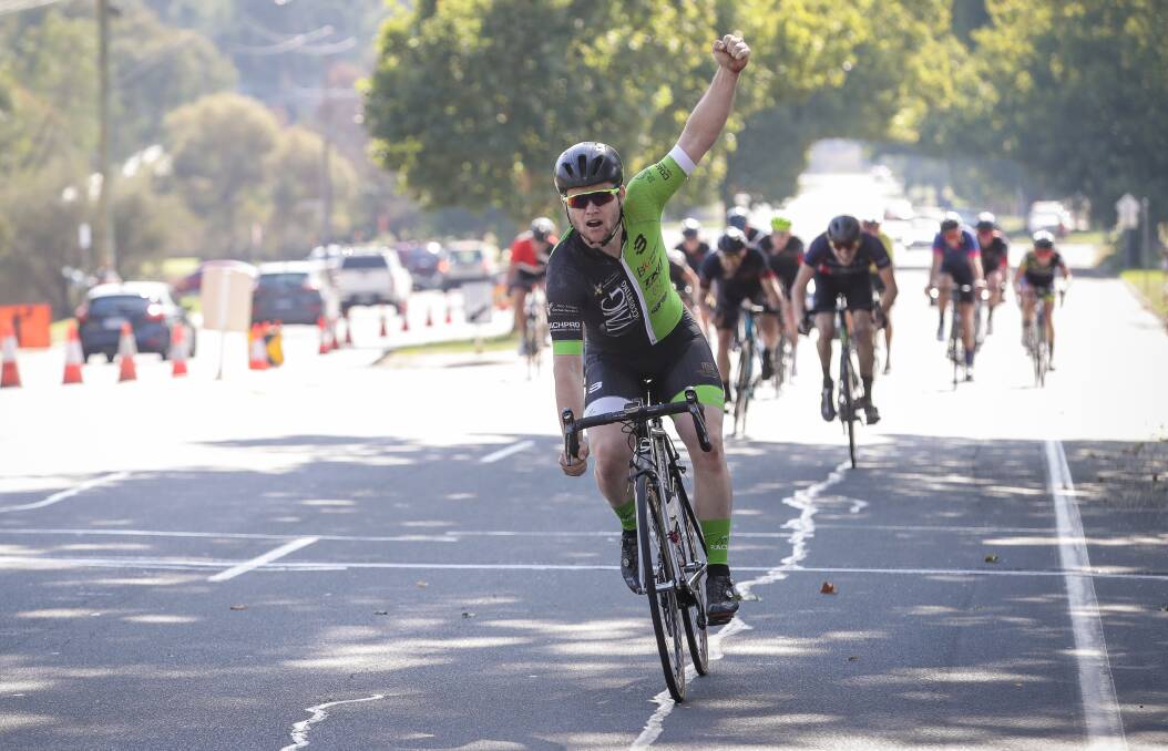 VICTORIOUS: A jubilant Jade Maddern crosses the finish line in Lavington to capture the biggest win of his career. Pictures: JAMES WILTSHIRE