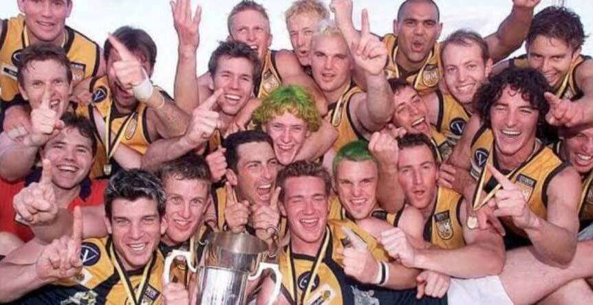 Justin Dickson and Tim Nicholls stood out with their green hair in North Albury's 2002 premiership photo.