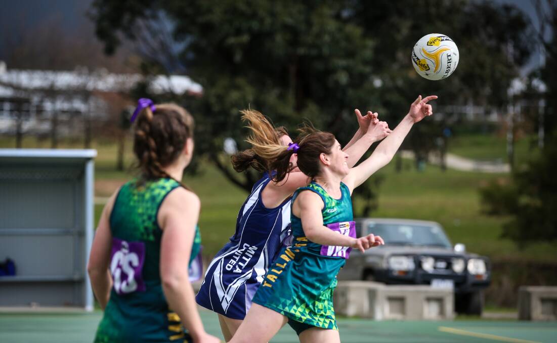 Tallangatta's Kellie Green battles for possession on the weekend. The Hoppers skipped clear early and were never threatened.