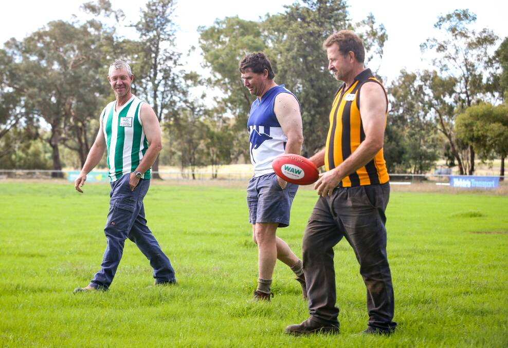 TURNING BACK TIME: Walla's Derek Kohlhagen, Brocklesby's Steve Koschitzke and Walbundrie's Kevin Wardius played over 800 games in the Hume league. Despite playing for no financial reward, they wouldn't change a thing. Picture: JAMES WILTSHIRE.