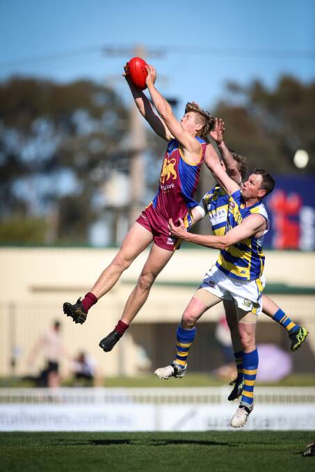 Lion star Nick Murray takes a mark at Robertson Oval. Picture: JIM WILTSHIRE