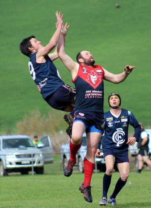 Cudgewa's Jake Vinge soars high during the Upper Murray league's first semi-final at Cudgewa on Saturday. Pictures: DEB HARRAP