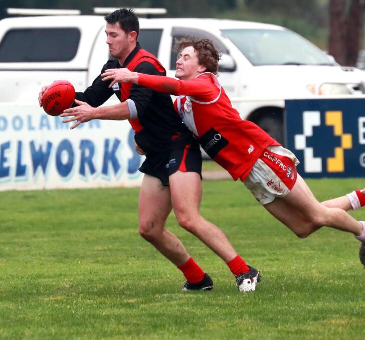 Marrar signing Charlie Hamilton is tackled by Collingullie Glenfield Park's Ed Perryman. Picture: DAILY ADVERTISER