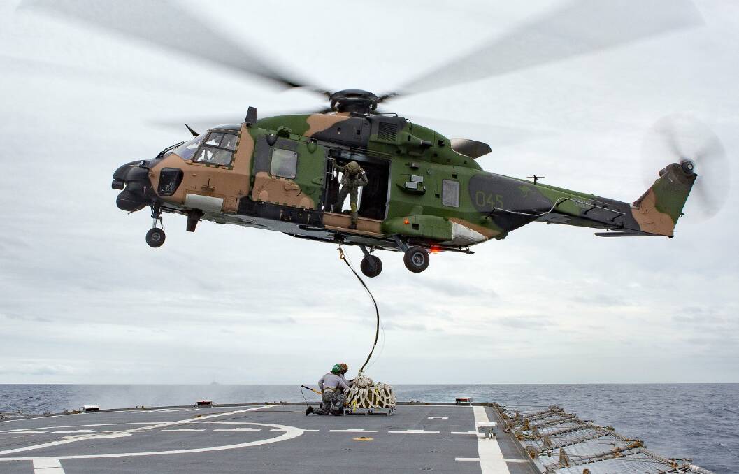 PRECAUTION: Defence has grounded the navy and army's MRH-90 helicopter fleet as precaution after a tail rotor vibration was detected during a flight. Photo: Steven Thomson