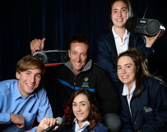 Wodonga Catholic College teacher Aaron West with year 10 students Rory Quinn, Alexia Brown, Lily Allan and Shai Allan, all 16, are excited Hamish and Andy will be attending the year 10 formal. Picture: MARK JESSER
