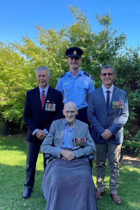 Four generations: A family picture of Jim Mooney, 101, with his son Ken, grandson Shane and great-grandson Brannick. 