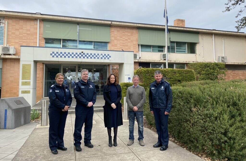Going at last: The antiquated Benalla police station will be replaced with funding in this year's Victorian budget. Police join Victorian minister Jaclyn Symes and Benalla mayor Danny Claridge at the site on Thursday.