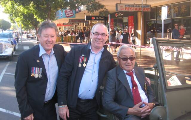 Anzac Day activity: LIndsay and Graham, the sons of Roy Poy, with Lindsay Poy who only began marching on April 25 after the death of his brother Roy.