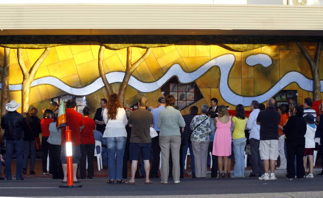 Flashback: A crowd watches on as the wall display is officially opened at an event on December 19, 2008, involving Wodonga mayor Mark Byatt and chief executive Gavin Cator.