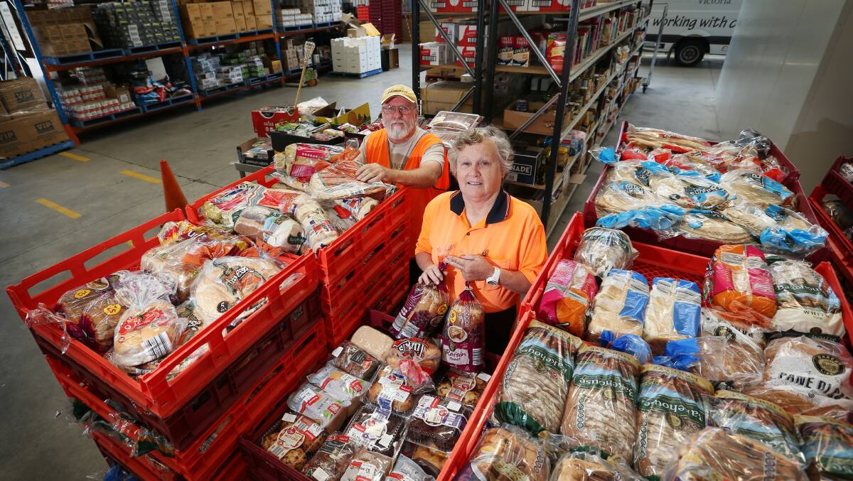 Beneficial: Volunteers at FoodShare's West Wodonga warehouse which receives rice, grain and pasta from Foodbank Victoria in Melbourne. 