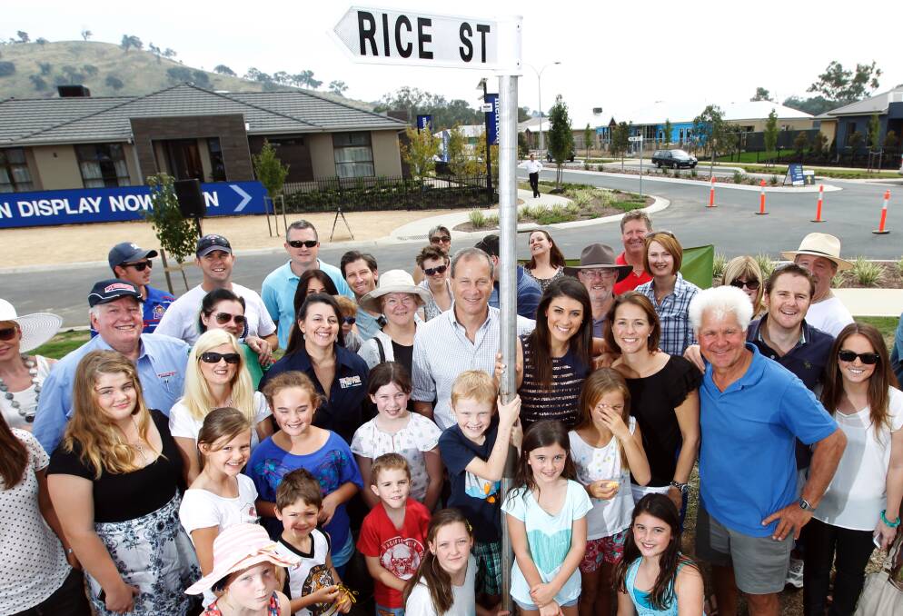 Grand day: Andrew Stern (left of pole) with Stephanie Rice (right of pole) on the day the street named after the Olympic champion was unveiled in 2013.