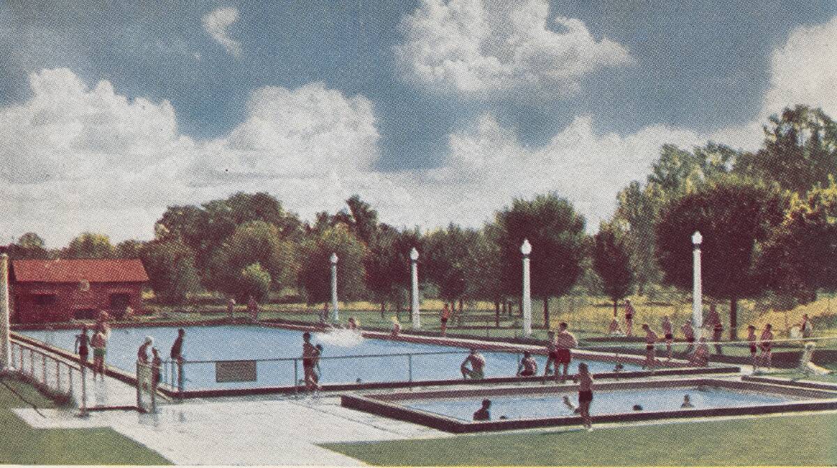 Yesteryear: Albury's pool in the 1950s looking towards the Murray River when the entrance faced the botanic gardens. The council has been accused of having a mindset from that era. Picture: STATE LIBRARY OF VICTORIA COLLECTION