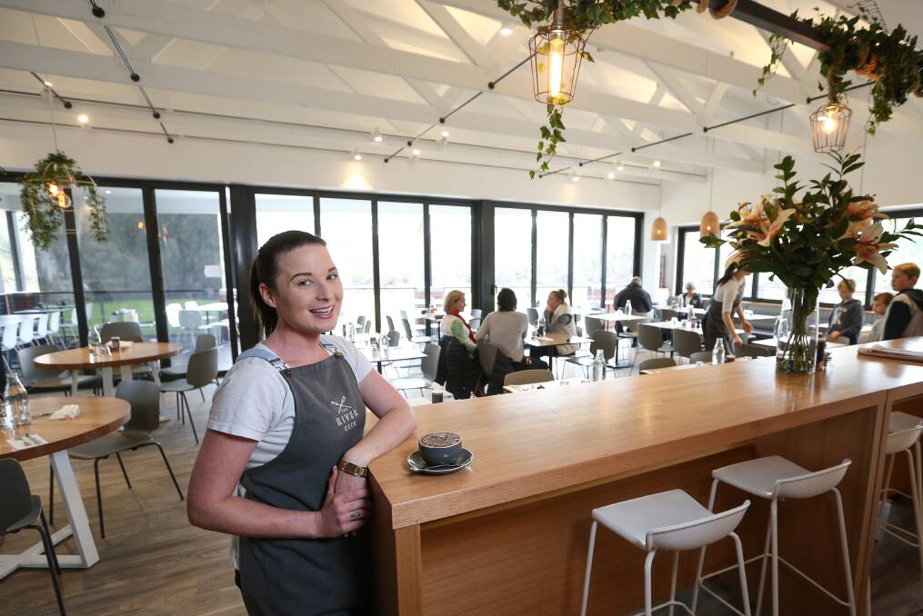 Winning outlook: The service of River Deck Cafe waitress and barista Kelsie Halsall and others was recognised with a regional tourism award at the weekend. Picture: JAMES WILTSHIRE