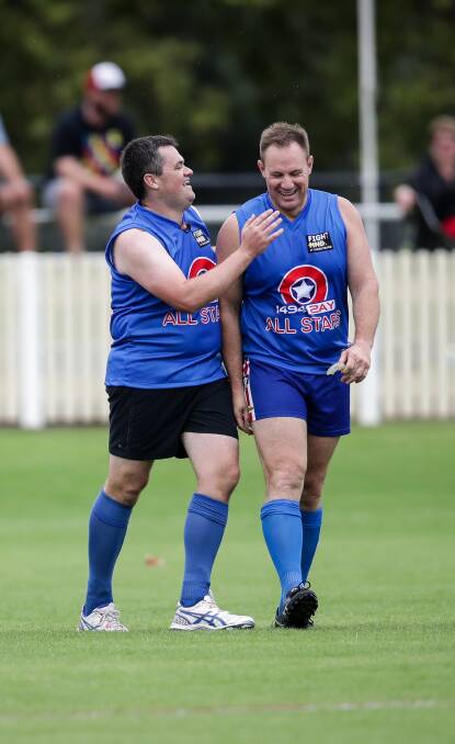 Switching fields: Wodonga Council candidate Kevin Poulton on the field for the 2AY All Stars with station colleague Matt Fowler in a charity match for motor neurone disease at the Albury Sportsground last year. Picture: JAMES WILTSHIRE