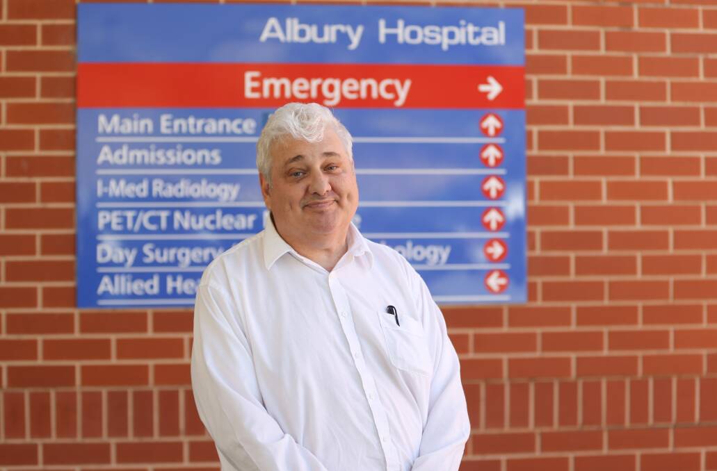 On the cusp of rollout: Health boss Michael Kalimnios outside Albury Hospital on Monday after announcing details of the COVID-19 vaccine program in the Twin Cities. Picture: TARA TREWHELLA
