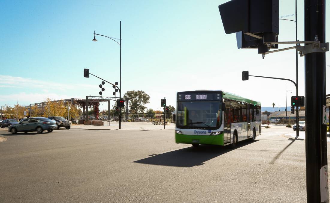 A bus travels through the centre of Wodonga. The city now has no joint transport plan with Albury after abandoning a collaborative strategy. Picture by Mark Jesser