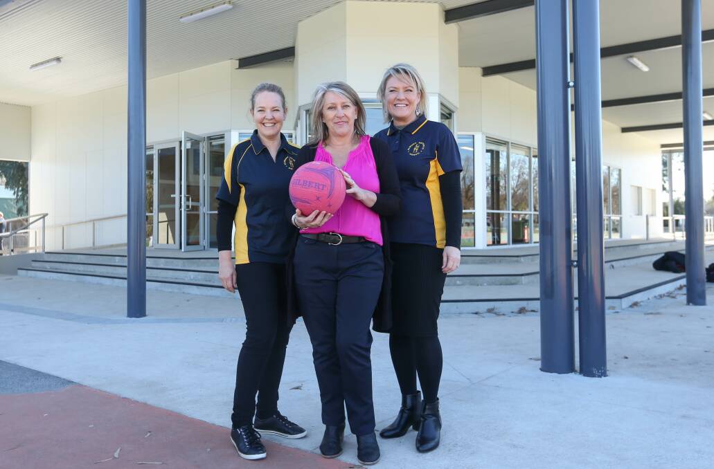 Proud trio: Albury Netball Association committee members Marie Butcher, Linda Barclay-Hales and Catherine Trinnick with the new clubhouse which features a timekeepers' room that protrudes from the body of the building to allow all 12 courts to be observed. Picture: TARA TREWHELLA