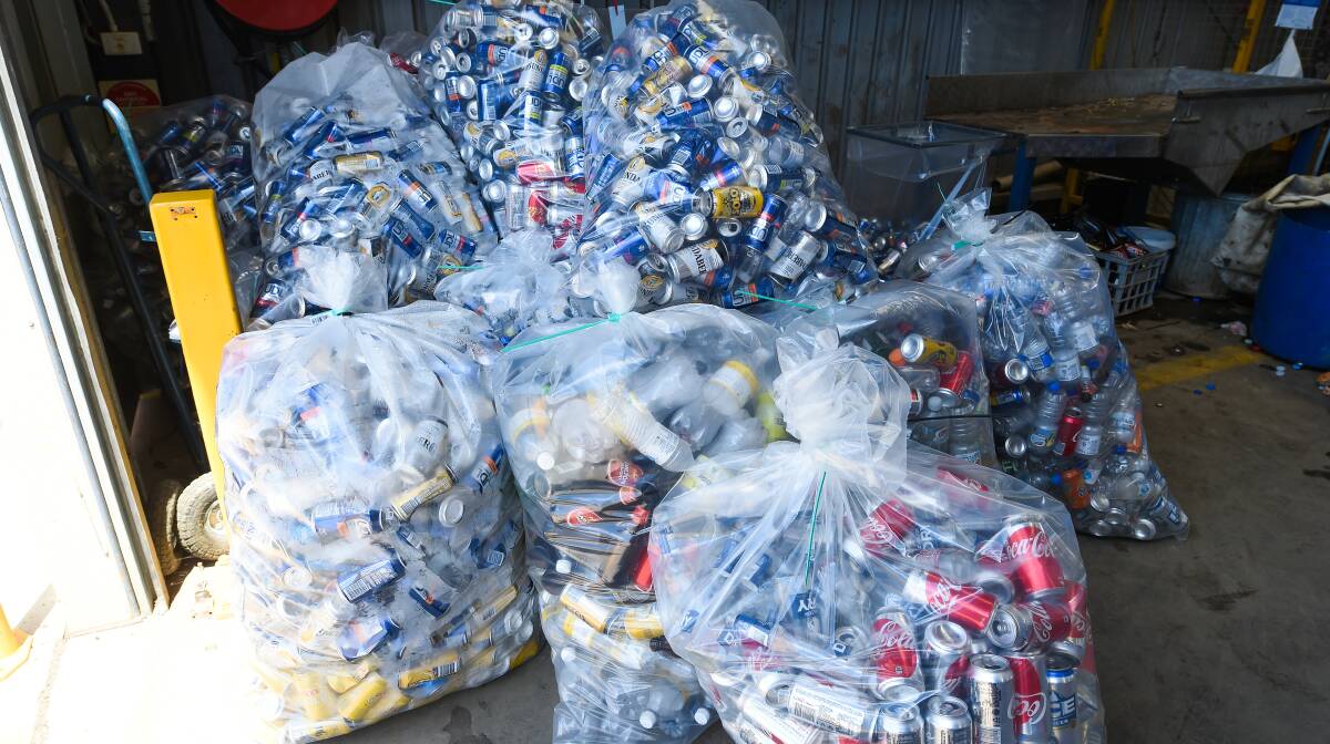 Ready to collect: Some of the bags of cans stacked up at Corowa's D & M Scrap Metal for Cleanaway to gather. Pictures: MARK JESSER