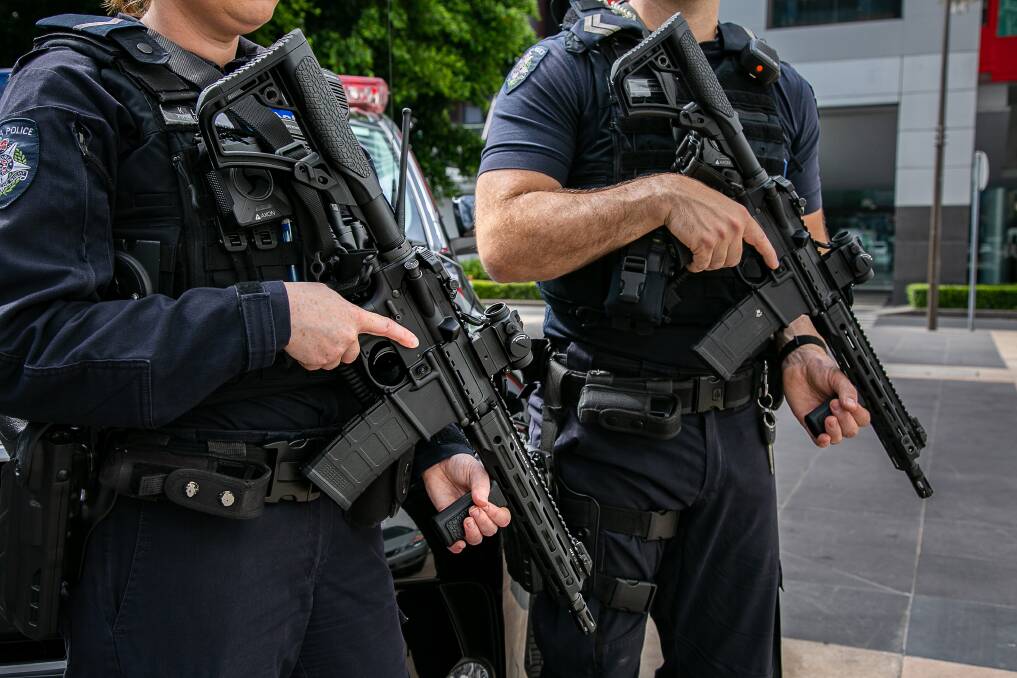 Firepower reinforced: Police with two of the semi-automatic rifles to be issued to Victoria Police in 2020, including officers at Shepparton.