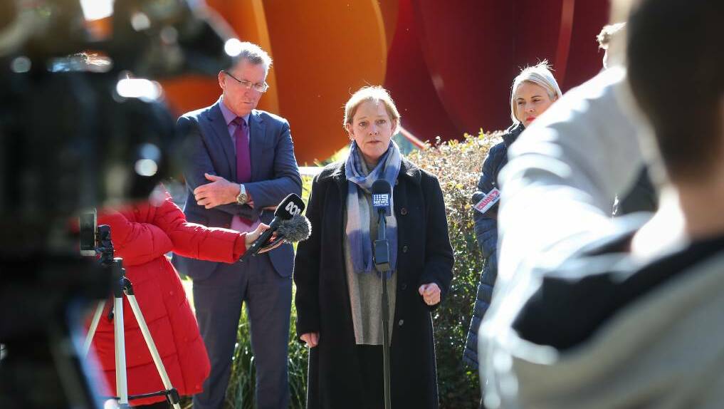 Going, going, gone: Jenny O'Connor is following Albury mayor Kevin Mack and Wodonga mayor Anna Speedie out of the top job. The three are pictured in July last year raising concerns about the closure of the Victorian border by NSW.
