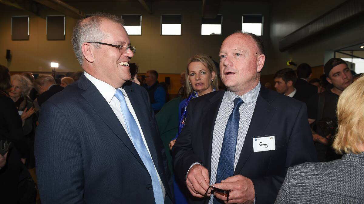 Flashback: Prime Minister Scott Morrison with Greg Mirabella at Lavington in 2018. The pair are now Liberal Party parliamentary colleagues.