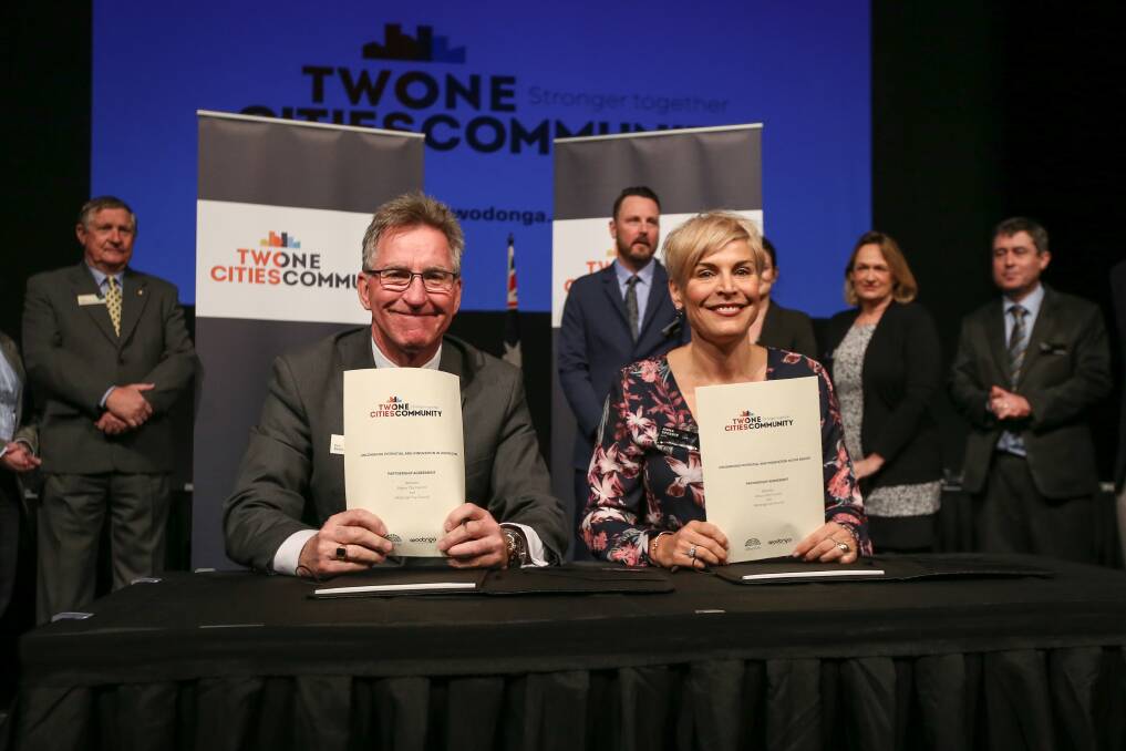 Flashback: Kevin Mack and Anna Speedie at the signing of the Two Cities One Community agreement in October 2017.