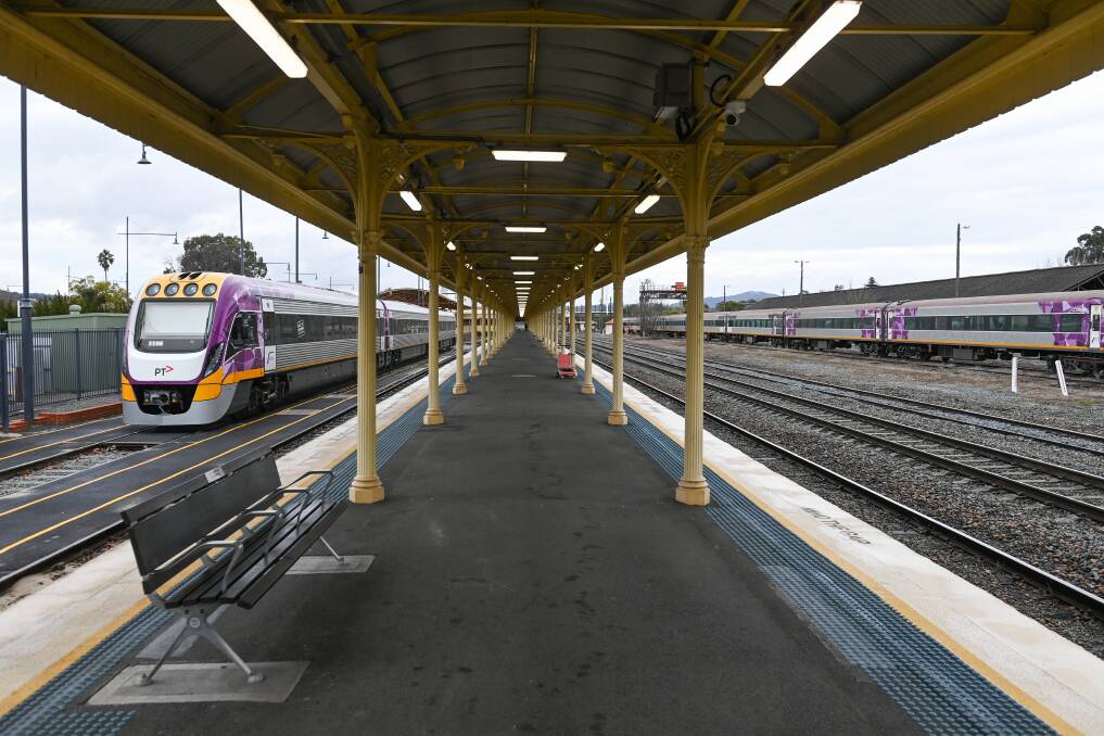 Old and the new: A VLocity train flanks one side of Albury's railway platform and decommissioned V/Line N Class carriages stand in the yard. Picture: MARK JESSER