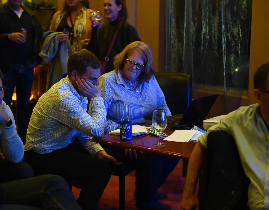 Numbers game: Steve Martin watches votes come in on a laptop. Picture: MARK JESSER