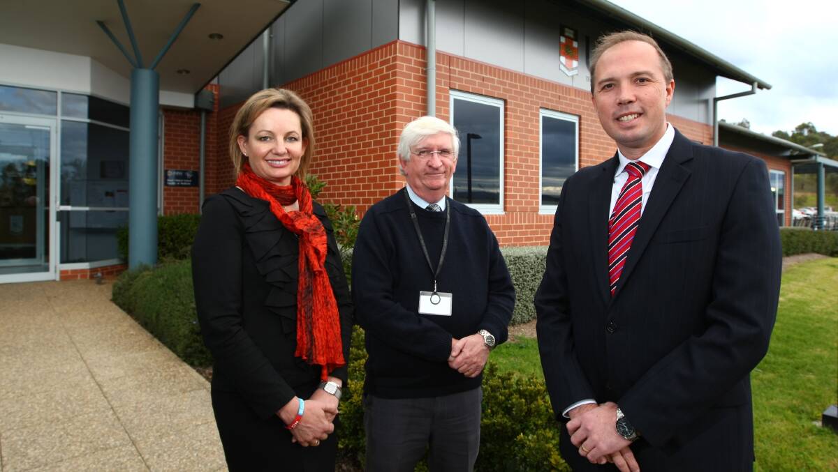 Flashback: Sussan Ley alongside clinical school lecturer Peter Vine and her Coalition colleague Peter Dutton in Albury in 2012.