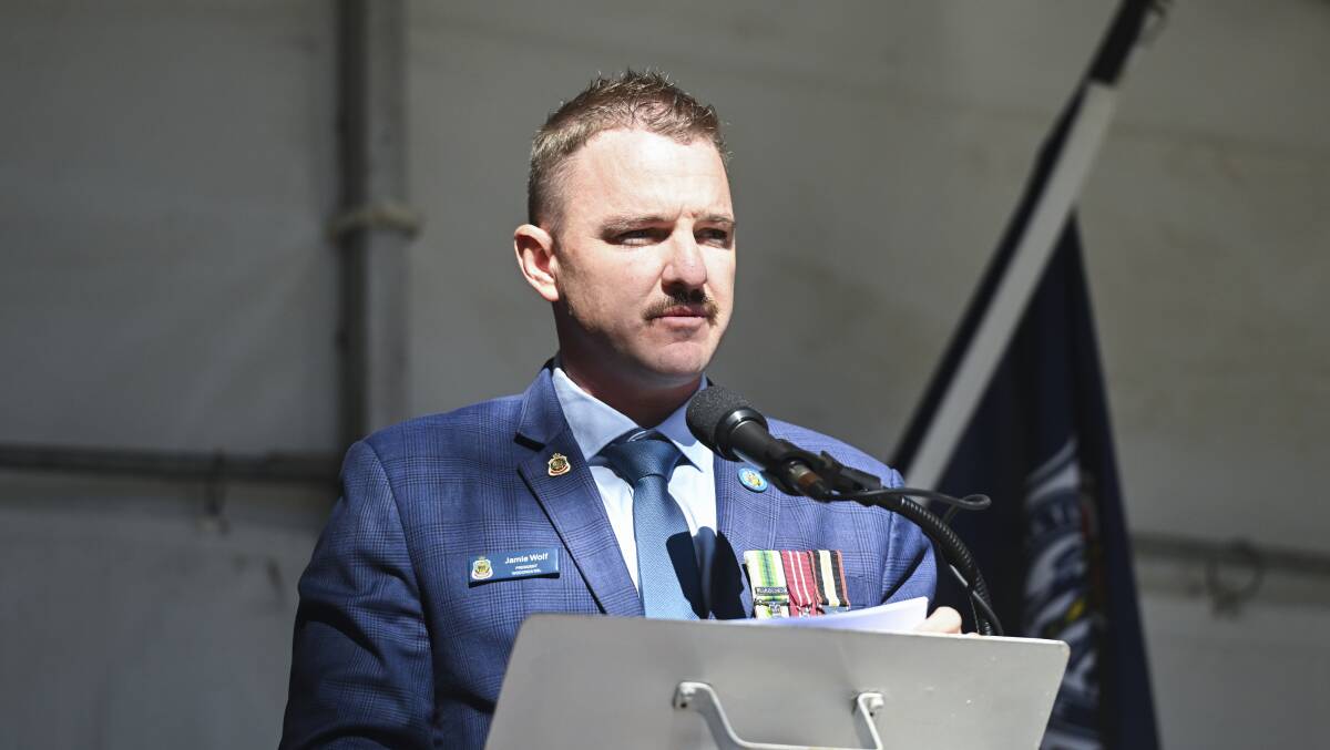 Wodonga RSL sub-branch president Jamie Wolf precedes over the morning service at Woodland Grove where he was able to leave the singing duties to Lisa Cullen. 