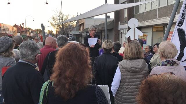 Delivering a message: Helen Haines speaks to those who gathered at her office at Wangaratta to support a family facing deportation after settling in Queensland.
