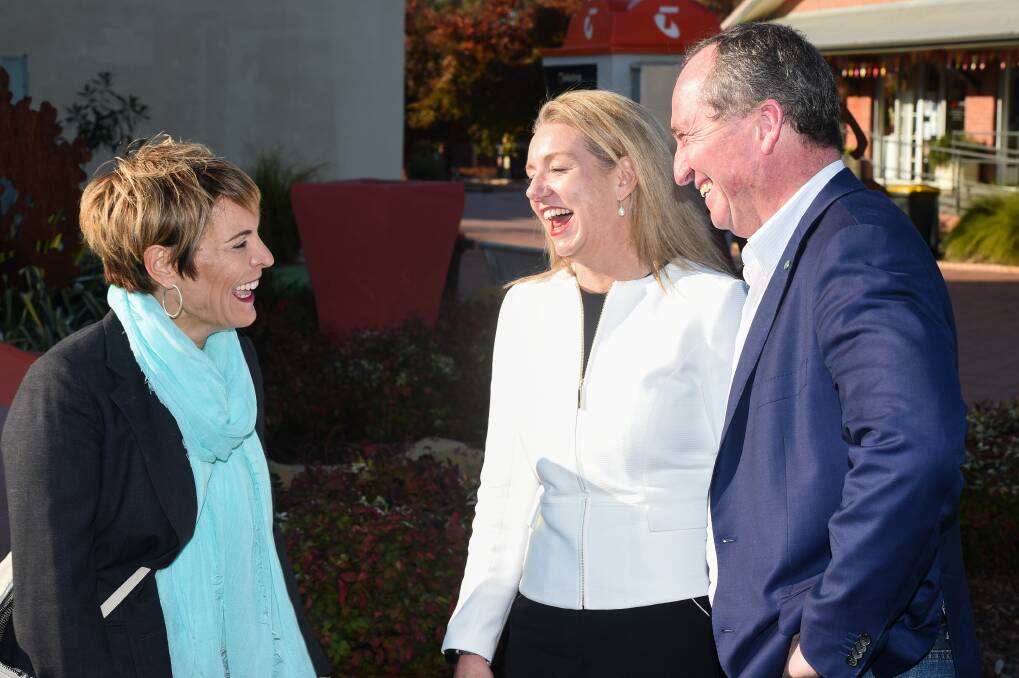 Happier times: Barnaby Joyce has a laugh with Wodonga mayor Anna Speedie and fellow National Bridget McKenzie during his last visit to the Border in May. 